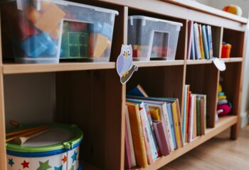 Shelves of toys and books in a nursery school